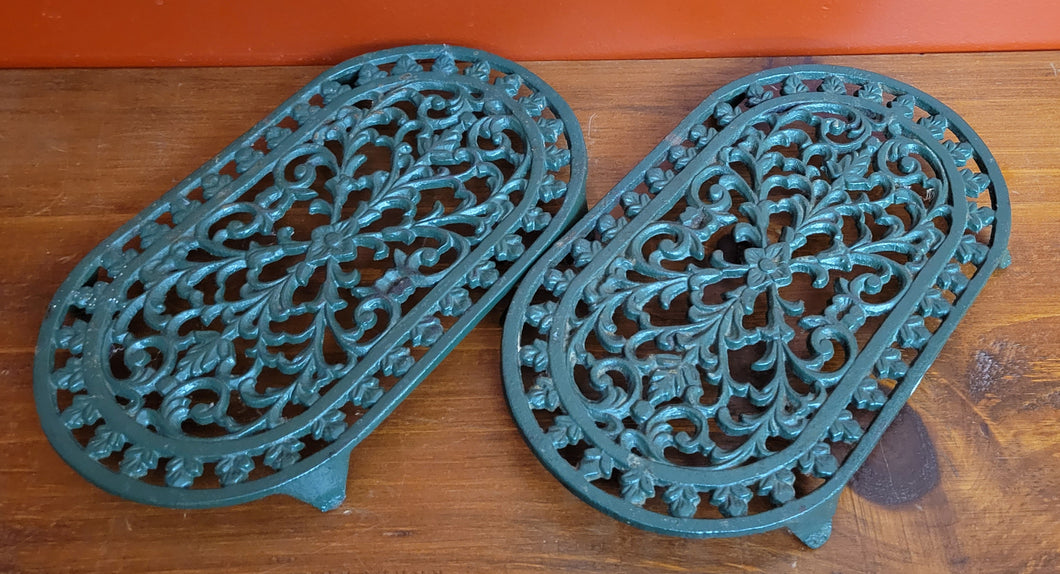 Pair of Victor Footed Oval Cast Iron Trivets