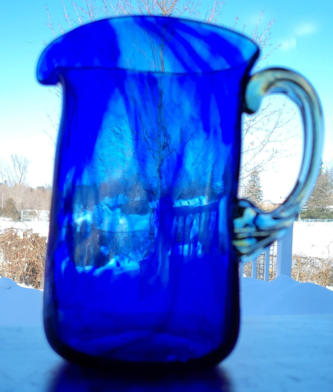 Cobalt Blue, Mouth Blown,  Artglass Pitcher w/ Pale Yellow Handle. Measures 6